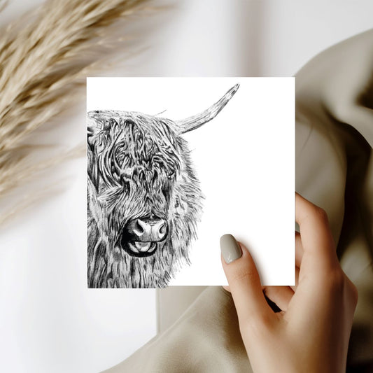 Menkar the Highland Cow Hand Drawn Greeting Card, featuring a beautifully detailed illustration of a Highland cow, perfect for gifting, displayed with a grey envelope.