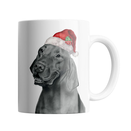 Dog 11 oz Ceramic Mug From Libra Fine Arts. A fun Christmas mug featuring. a hand drawn meerkat with red santa hat, perfect stocking filler or secret santa gift or present. A great christmas present for dog lovers and vizsla fans