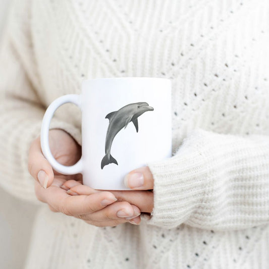 Dolphin 11oz Ceramic Mug From Libra Fine Arts. Hand-drawn dolphin  design ceramic mug, the perfect gift for family members, featuring intricate artwork and a personal touch. Great birthday present and christmas presents for those who love dolphins and other sealife