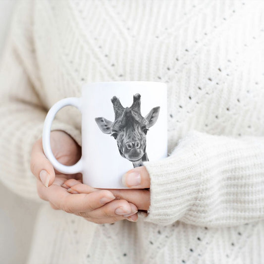 Hand-drawn giraffe design ceramic mug, the perfect gift for family members, featuring intricate artwork and a personal touch.