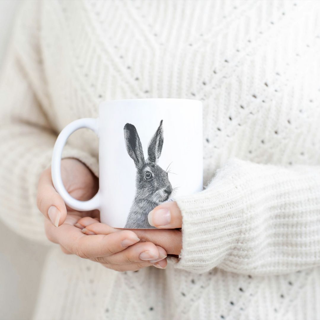 Hand-drawn countryside bare design ceramic mug, the perfect gift for family members, featuring intricate artwork and a personal touch. Great birthday present and christmas presents for those who love hares and the countryside 