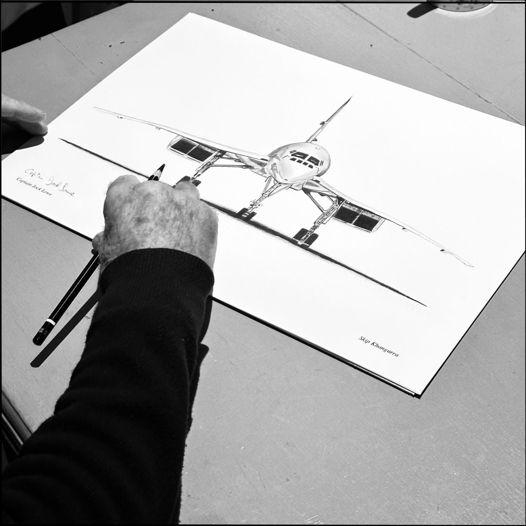 A photograph capturing Jock Lowe, renowned Concorde pilot, signing a set of 250 limited edition prints. The image highlights the unique and prestigious moment, where each print is personally autographed by Jock Lowe, adding authenticity and exclusivity to these collector's items. This event celebrates the legacy of Concorde and its connection to one of its most iconic pilots.







