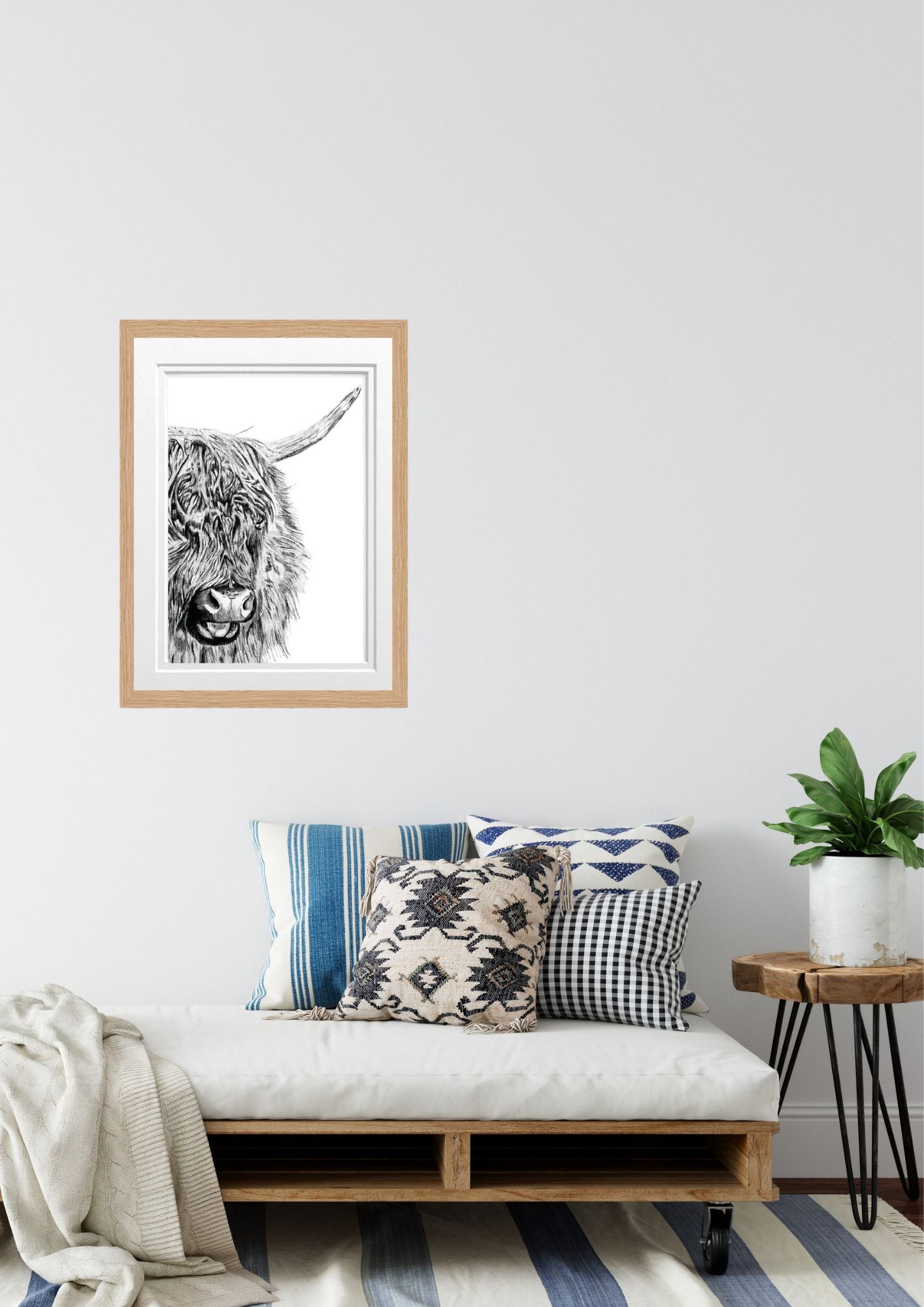 Libra_Fine_Arts_Hand_Drawn_Highland_Cow_Drawing_in_oak_Frame_hanging_above_a_sofa.__perfect_gift_for_countryside_and_highland_cow_lovers.