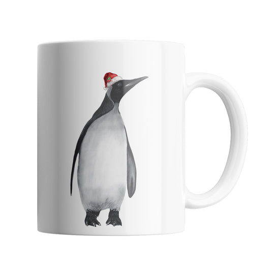 Penguin 11 oz Christmas Ceramic Mug From Libra Fine Arts. A hand drawn penguin with red santa hat, perfect stocking filler or secret santa gift or present. A great christmas present for penguin and bird lovers and sealife ans