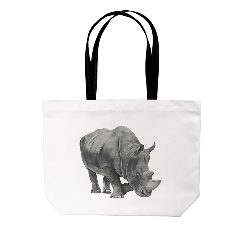 Rhino Tote Bag From Libra Fine Arts. : A stylish tote bag featuring a hand-drawn design of a charming rhino . Made from high-quality materials, this bag is both practical and eye-catching, perfect for birthday presents and christmas presents for everyday use or as a unique gift for animal lovers and fans of safaris