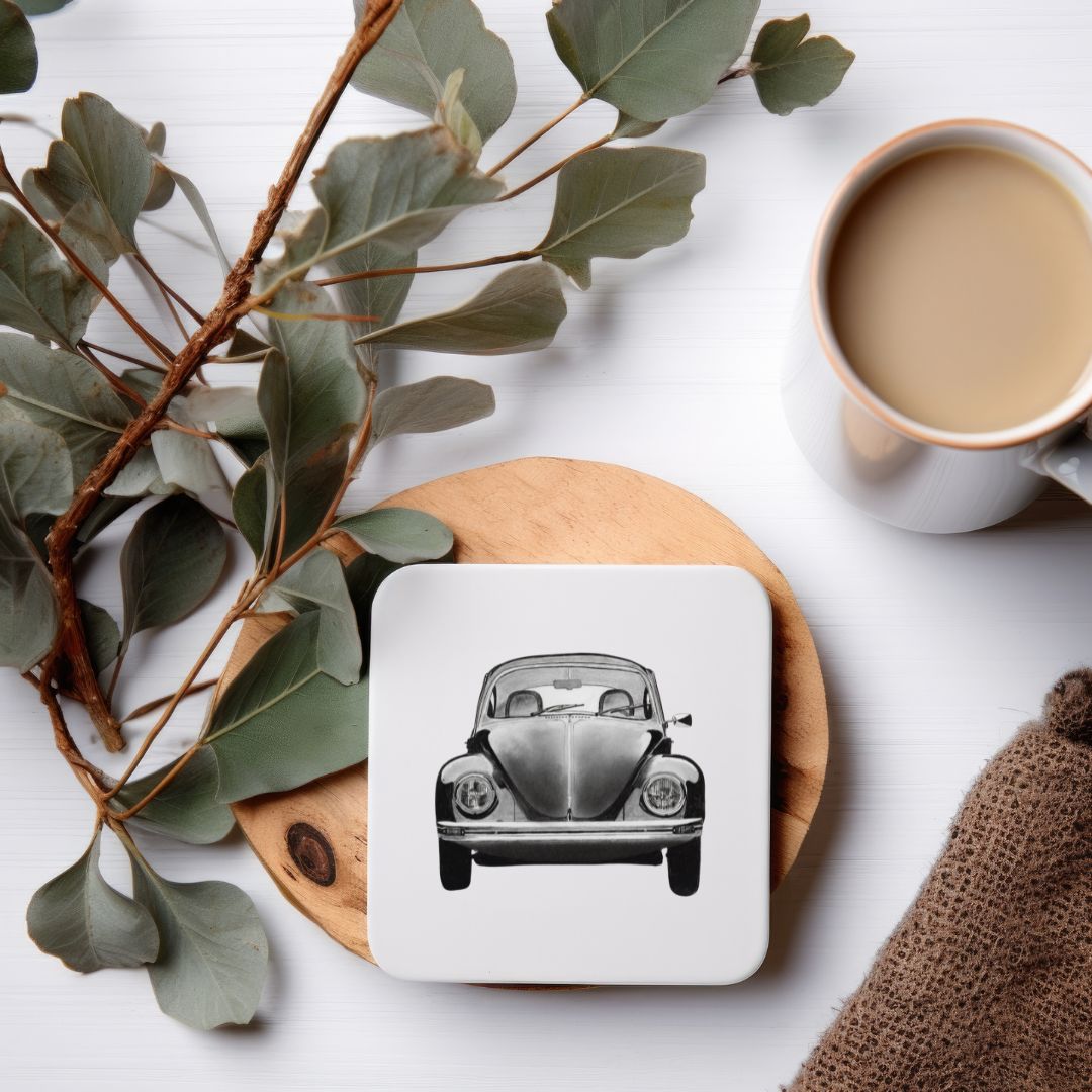 VW Beetle Drinks Coaster From Libra Fine Arts . Sustainable vw beetle coaster, hand-drawn by Libra Fine Arts, featuring a realisitic vw beetle car illustration. Eco-friendly and perfect for car lovers.a wonderful birthday present or christmas present for VW beelte car fans and classic car lovers