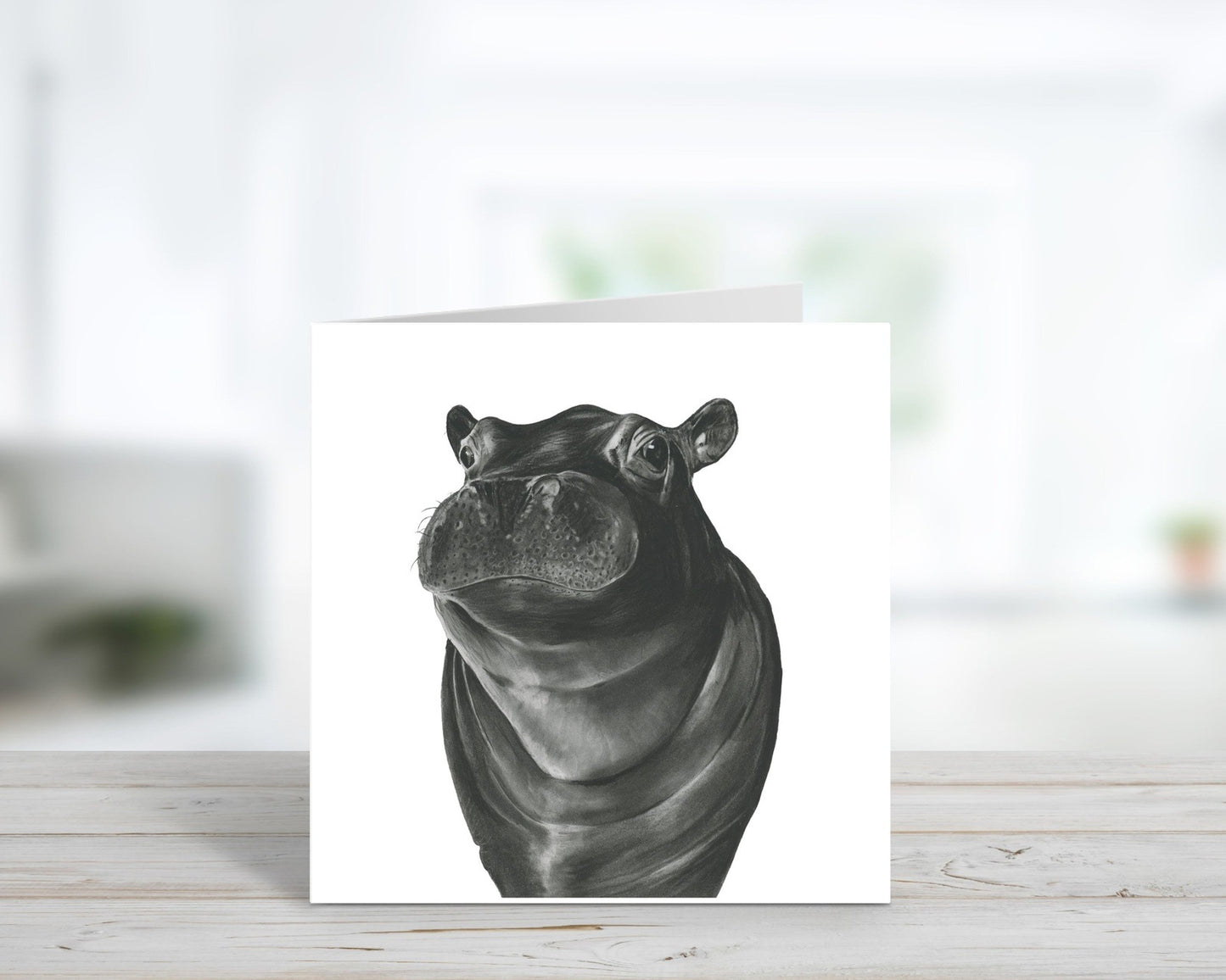 A Hand Drawn Hippo Greeting Card From Libra fine Arts. Hand-drawn hippo greeting card featuring a playful illustration, perfect as a birthday card or general message for safari lovers